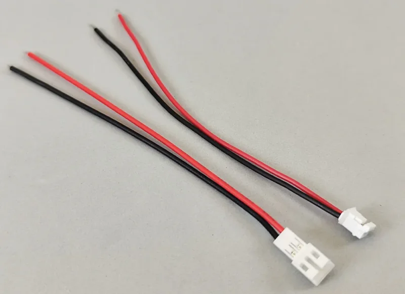 Stecker Kombi (1). JST-PH 2-polig, 26AWg/0,128m2 Kabel je 10cm lang, für Beleuchtungskits und Motoraschluss